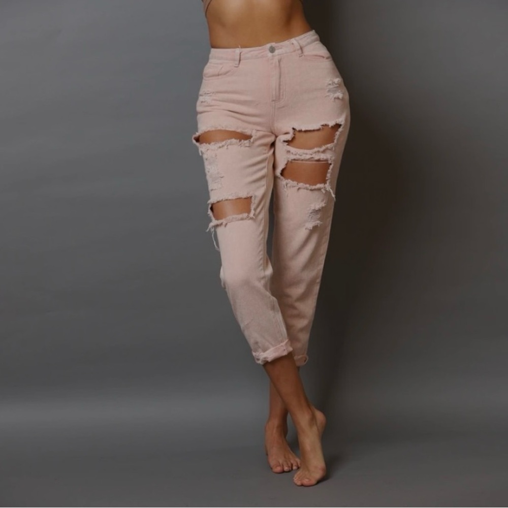 Light pink jeans with holes